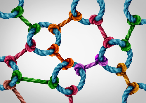 Picture of multi-colored ropes tied and connected together metaphorically representing the integrations of other applications to GroundSwell ONE℠ using connectors and/or APIs and webhooks.